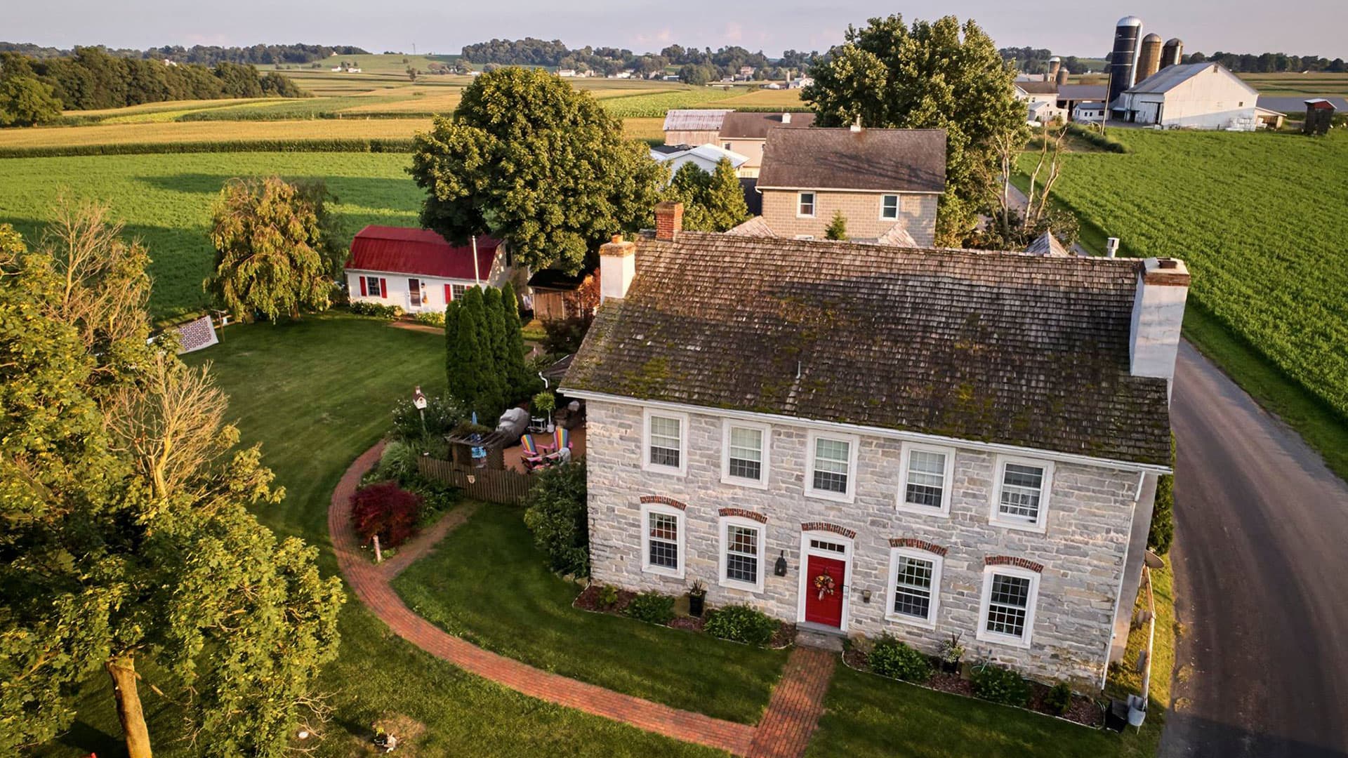 Aerial View of Osceola Mill House and surrounding buildings with farm in background